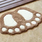tapis de bain doux en forme de pied