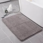 tapis de bain doux et absorbant