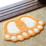 tapis de douche en forme de pied
